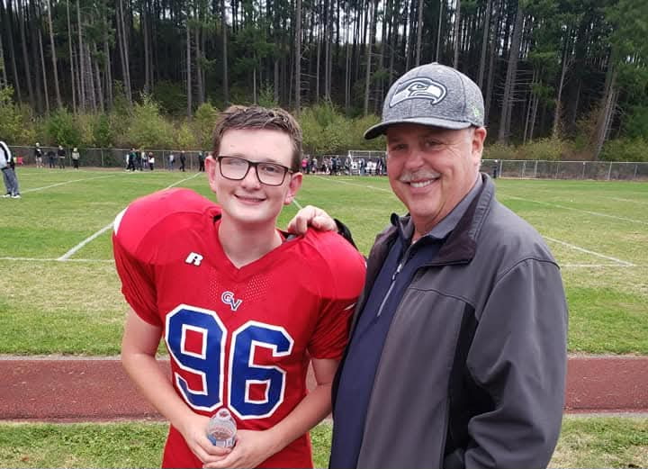 Baron Rousseau (a 12year-old Glacier View center in this 2020 photo) with his grandfather, Keith Bride. 